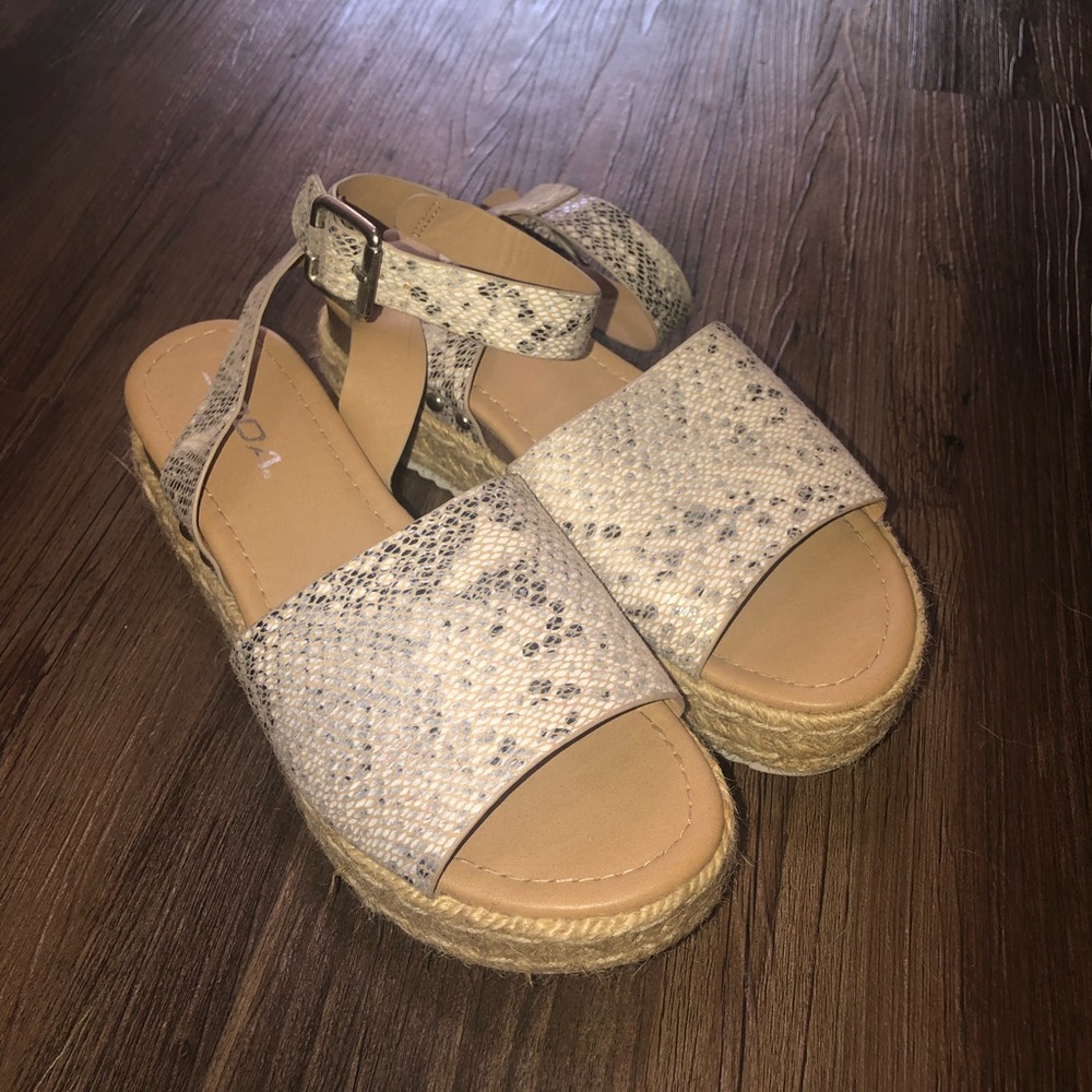 Soda brand platform snakeskin sandals